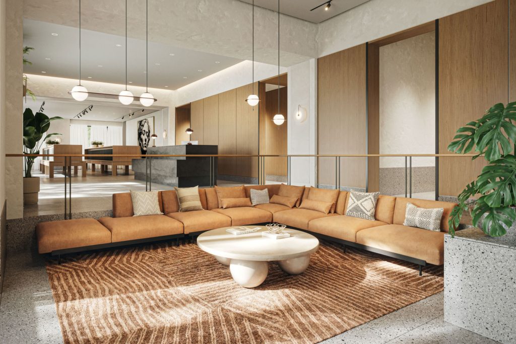 Sunken lounge at 499 President St luxury apartments in Brooklyn, NY with hanging lights and L-shaped couch.