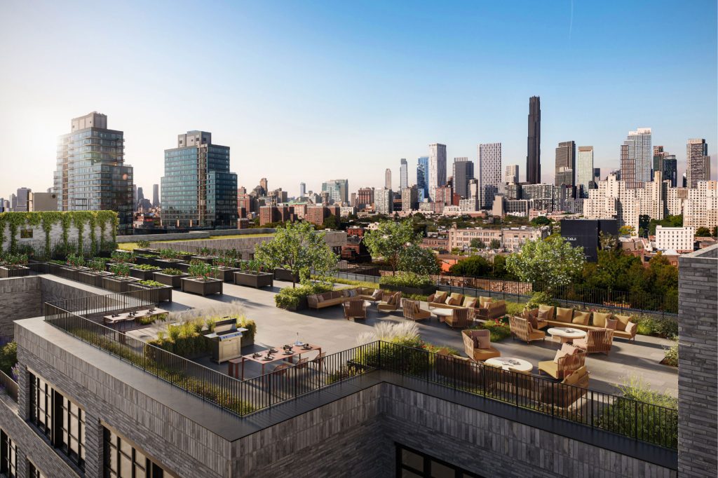 Outdoor dining and lounge with landscaped terrace with multiple seating and grilling stations at 499 President.