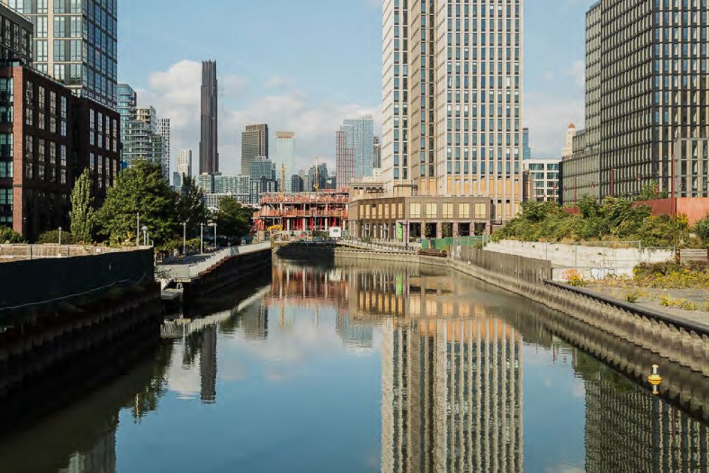 View of the Gowanus Canal with the Brooklyn skyline in the background, home to the new apartment rentals at 499 President St.