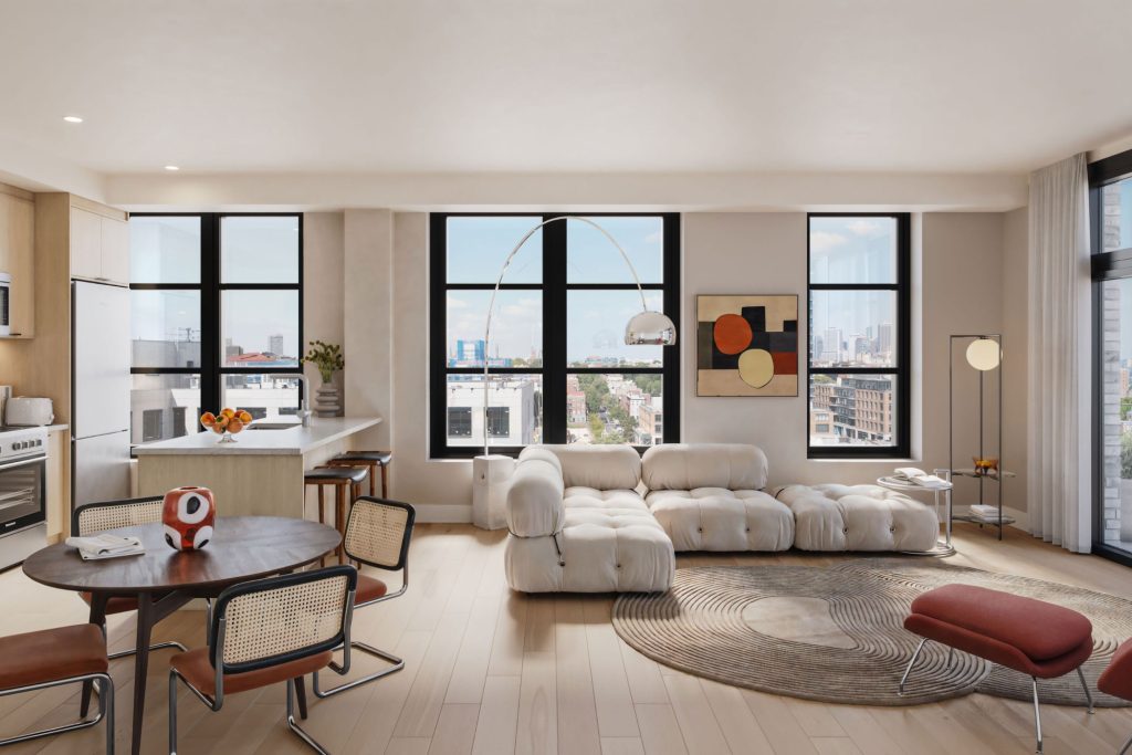 Living room and kitchen in a studio apartment at 499 President St, new luxury rentals in Brooklyn, NY.