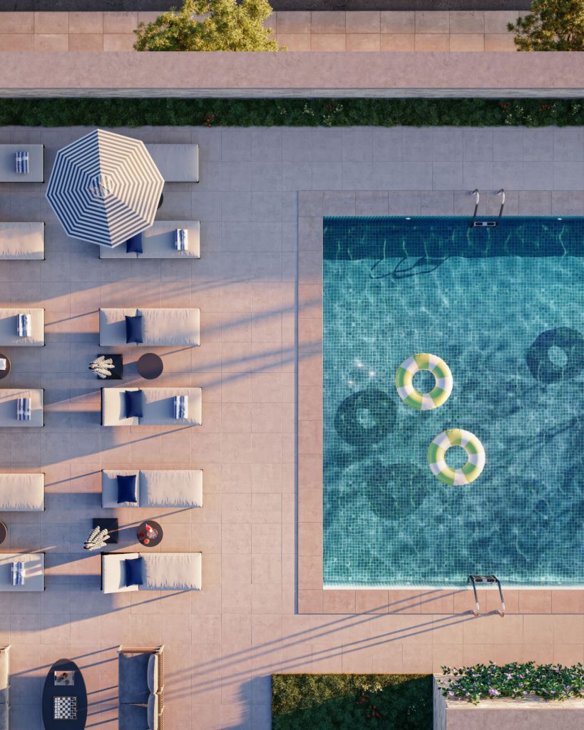 Aerial view of the outdoor pool with lounge chairs and grilling stations at 499 President, new luxury rentals in Gowanus.